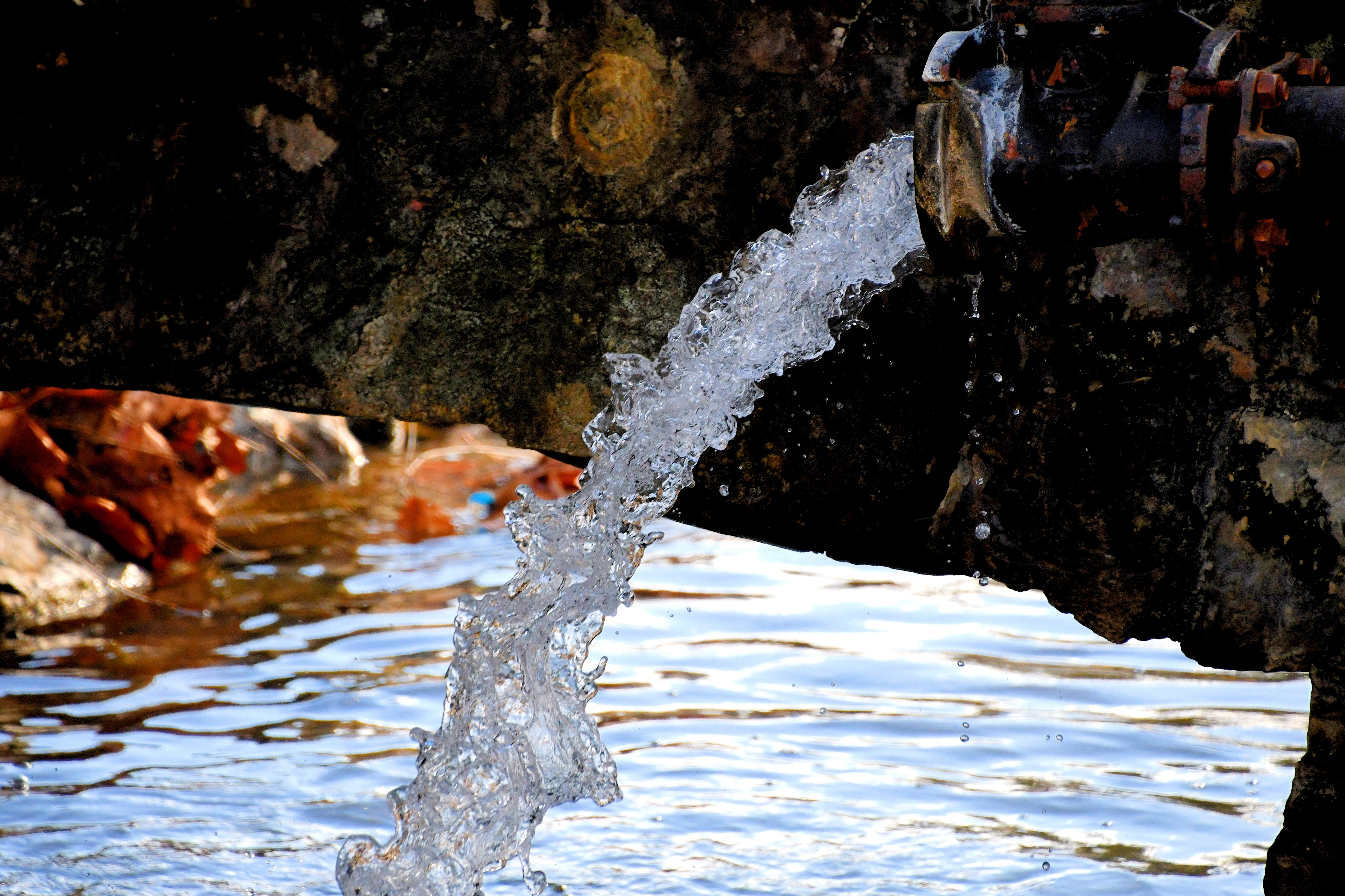 Produced Water Pouring Out Of A Pipe